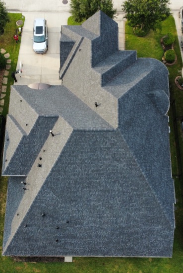 Rayburn's Roofing team working on residential project